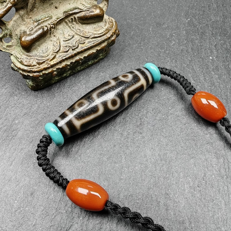 Tibetan 9 Eyes Dzi Bead Necklace | 1.5" x 0.4"