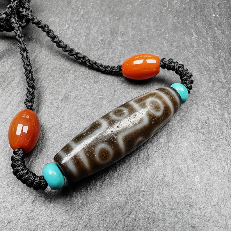 Tibetan 9 Eyes Dzi Bead Necklace | 1.5" x 0.4"