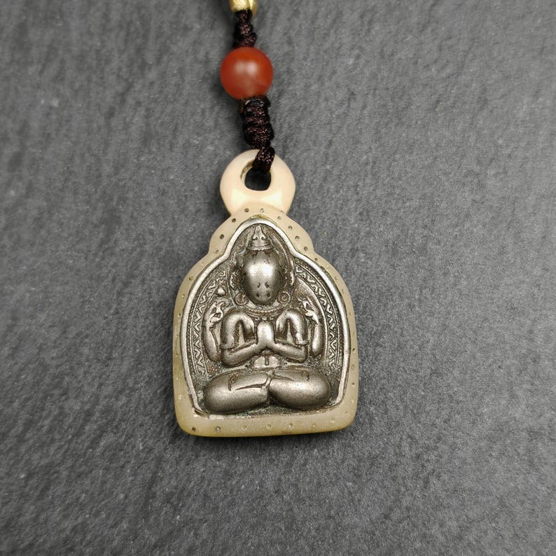 Buddhist Amulet | Copper Chenrezig Badge in Yak Bone Frame