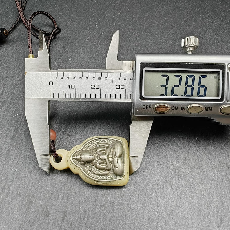 Buddhist Amulet | Copper Chenrezig Badge in Yak Bone Frame
