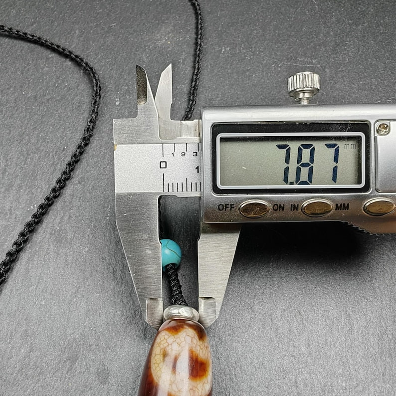 Fire Agate Lotus Dzi Amulet 31 x 15mm