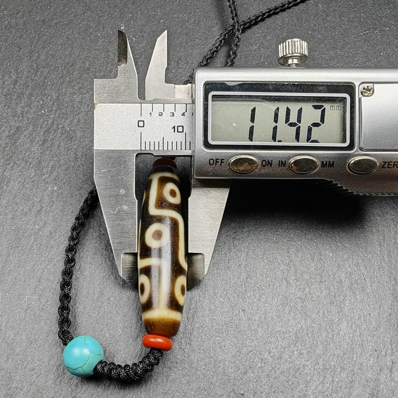 9 Eyes Dzi Bead Necklace | 41 x 11"