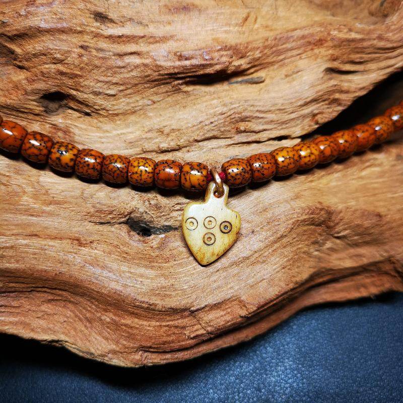 Bone Carved Nubro Pendant - Gandhanra-ART