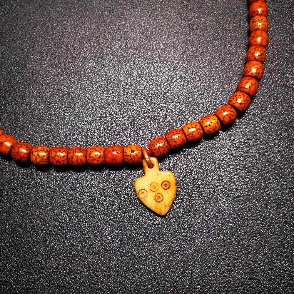 Bone Carved Nubro Pendant - Gandhanra-ART