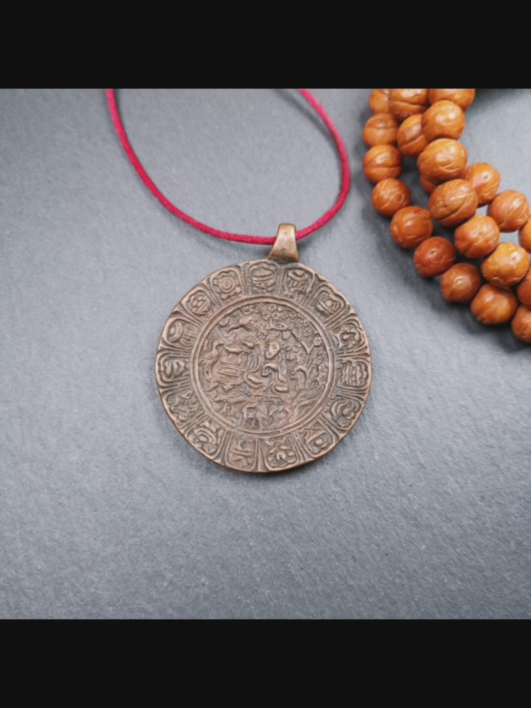 This old Longevity Badge was collected from Ganzi County Tibet about 100 years. It is made of copper,the theme is Shou-lao(the god of longevity) surrounded by the symbols of Ashtamangala. He is the ancient Chinese God of Longevity, represent Amitayus