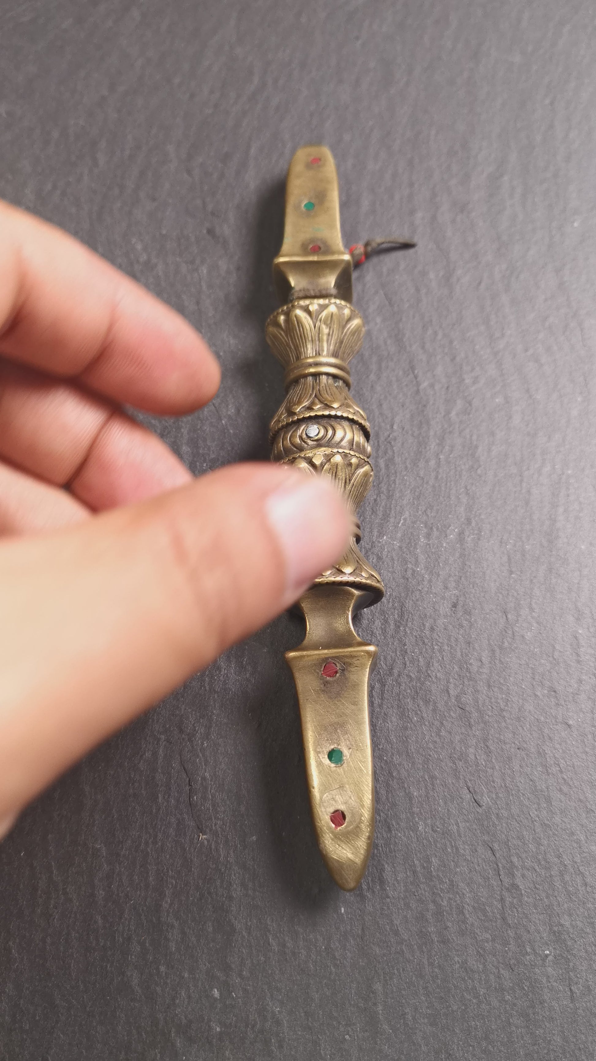 These beautiful vajra were handmade by Tibetan craftsmen from Tibet in 1990s,from Hepo Town, Baiyu County, the birthplace of the famous Tibetan handicrafts. It is five-pronged vajra,made of brass,inlaid agate,yellow color,6.5 inches length.