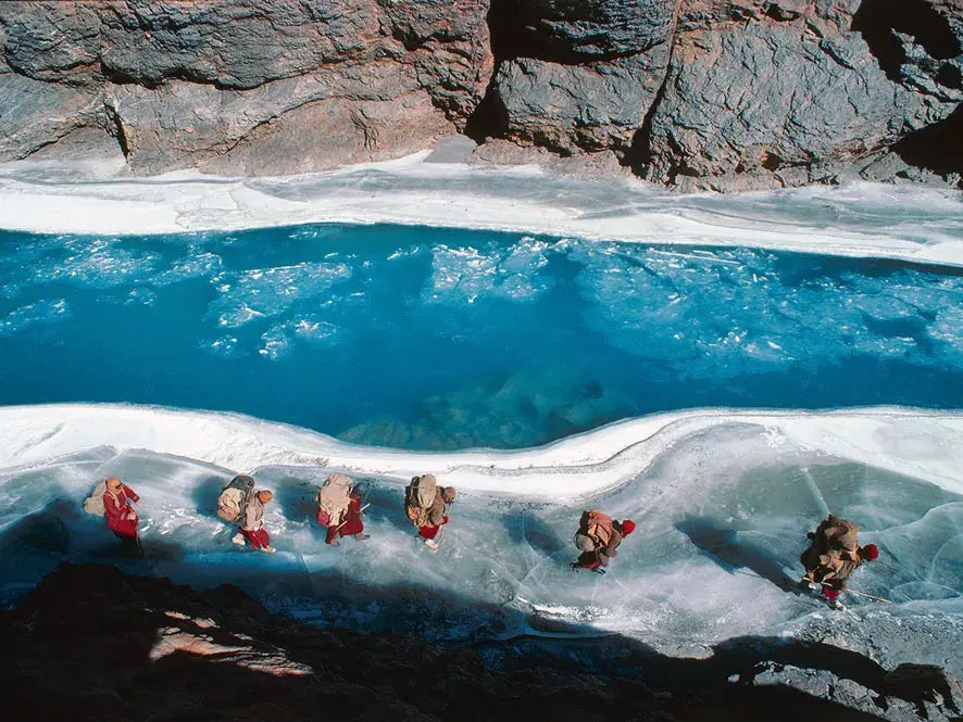 World Press Photo Award winner, journey across the icy river.