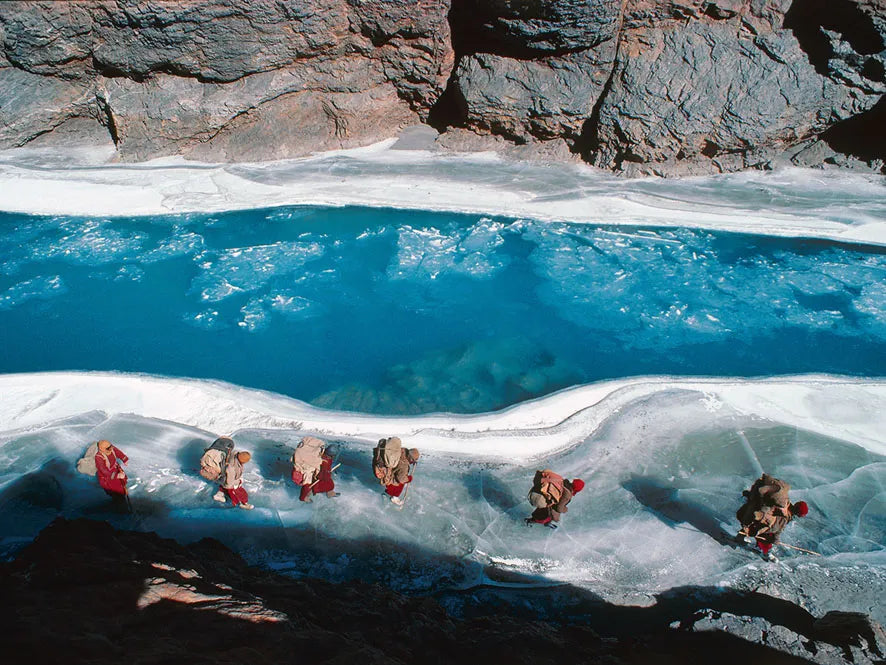 World Press Photo Award winner, journey across the icy river.