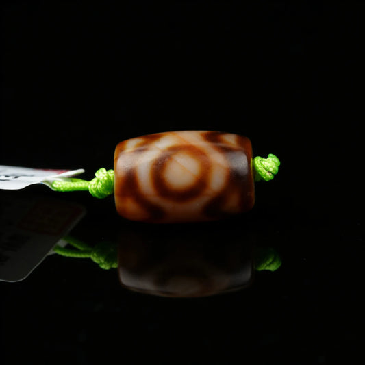 Backing 3 eyes Dzi Bead Meaning: Benefits, Symbolism & How to Use