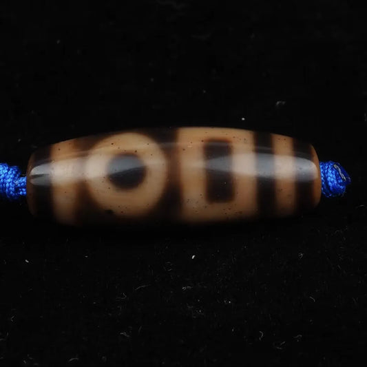 Backing Heaven and Earth Dzi Bead Meaning: Benefits, Symbolism & How to Use