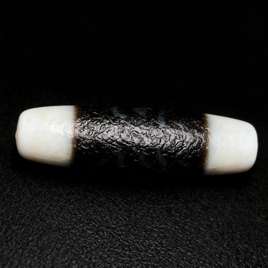 Black and White Dzi Bead Meaning: Benefits, Symbolism & How to Use