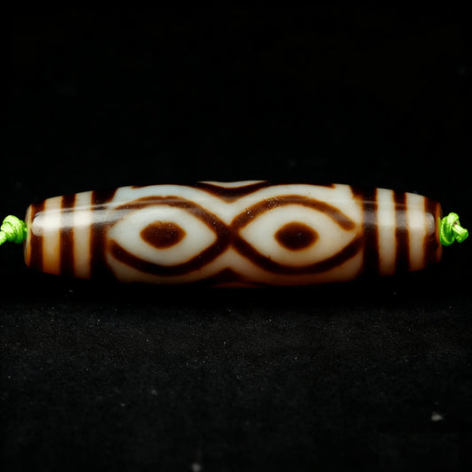 Cross 6 eyes Dzi Bead Meaning: Benefits, Symbolism & How to Use