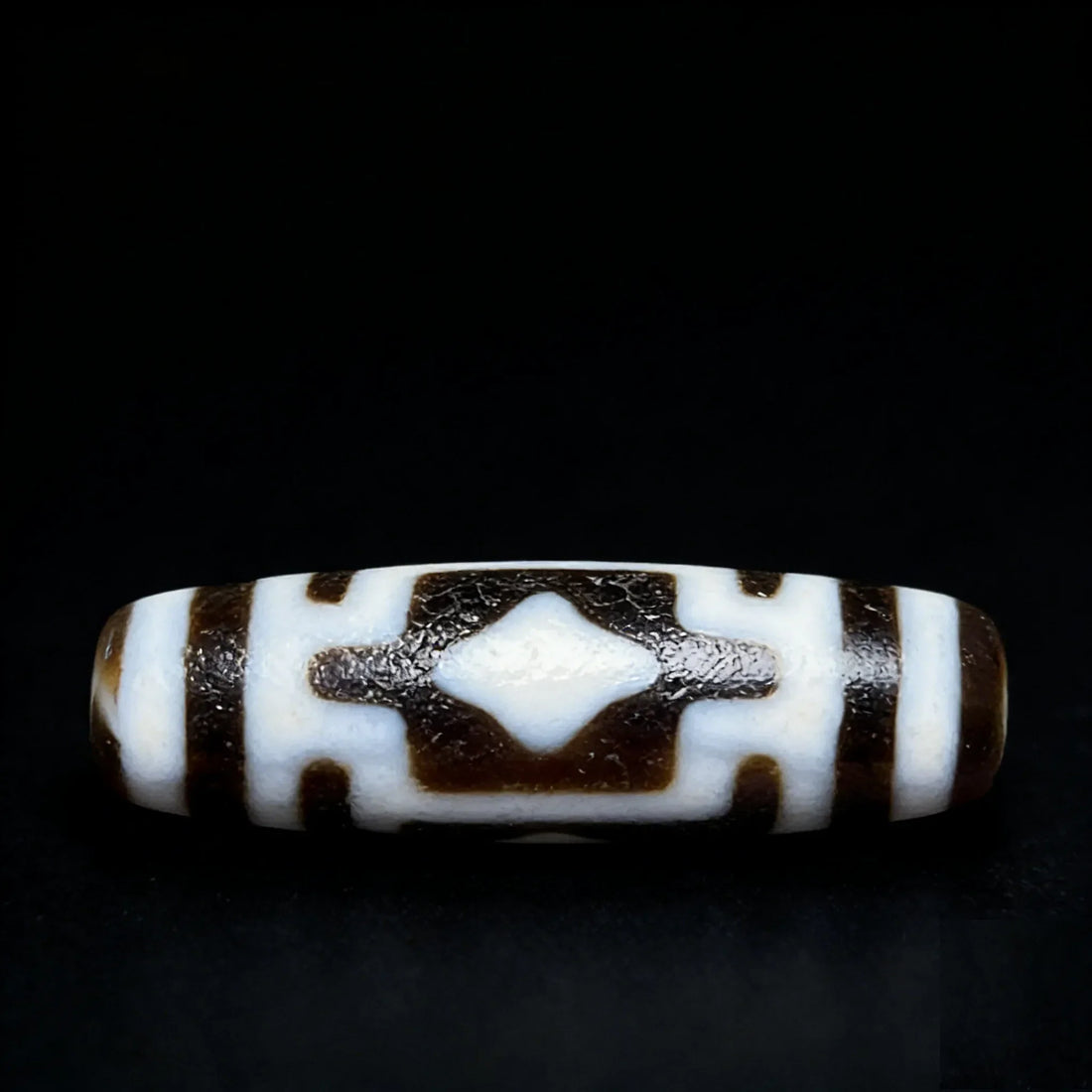 Cross Buddha Dzi Bead Meaning: Benefits, Symbolism & How to Use