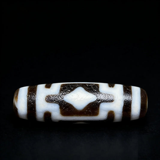 Cross Buddha Dzi Bead Meaning: Benefits, Symbolism & How to Use