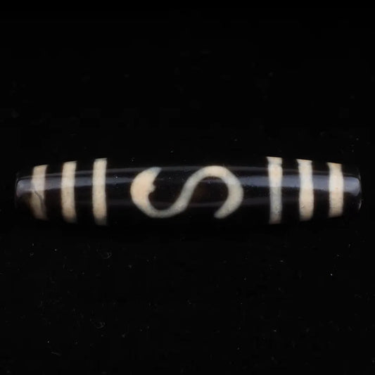Money Hook Dzi Bead Meaning: Benefits, Symbolism & How to Use