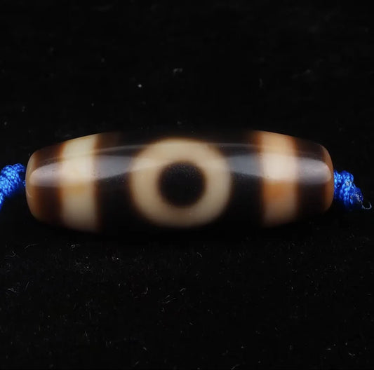 One Eye Dzi Bead Meaning: Benefits, Symbolism & How to Use