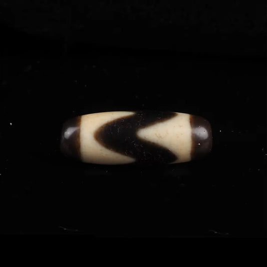 Tiger Tooth Dzi Bead Meaning: Benefits, Symbolism & How to Use