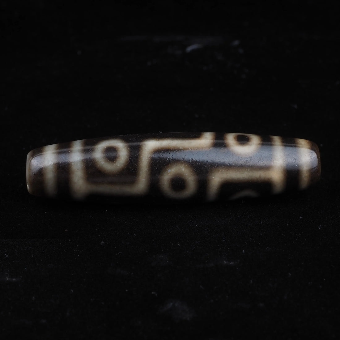 Zigzag 9 eyes Dzi Bead Meaning: Benefits, Symbolism & How to Use