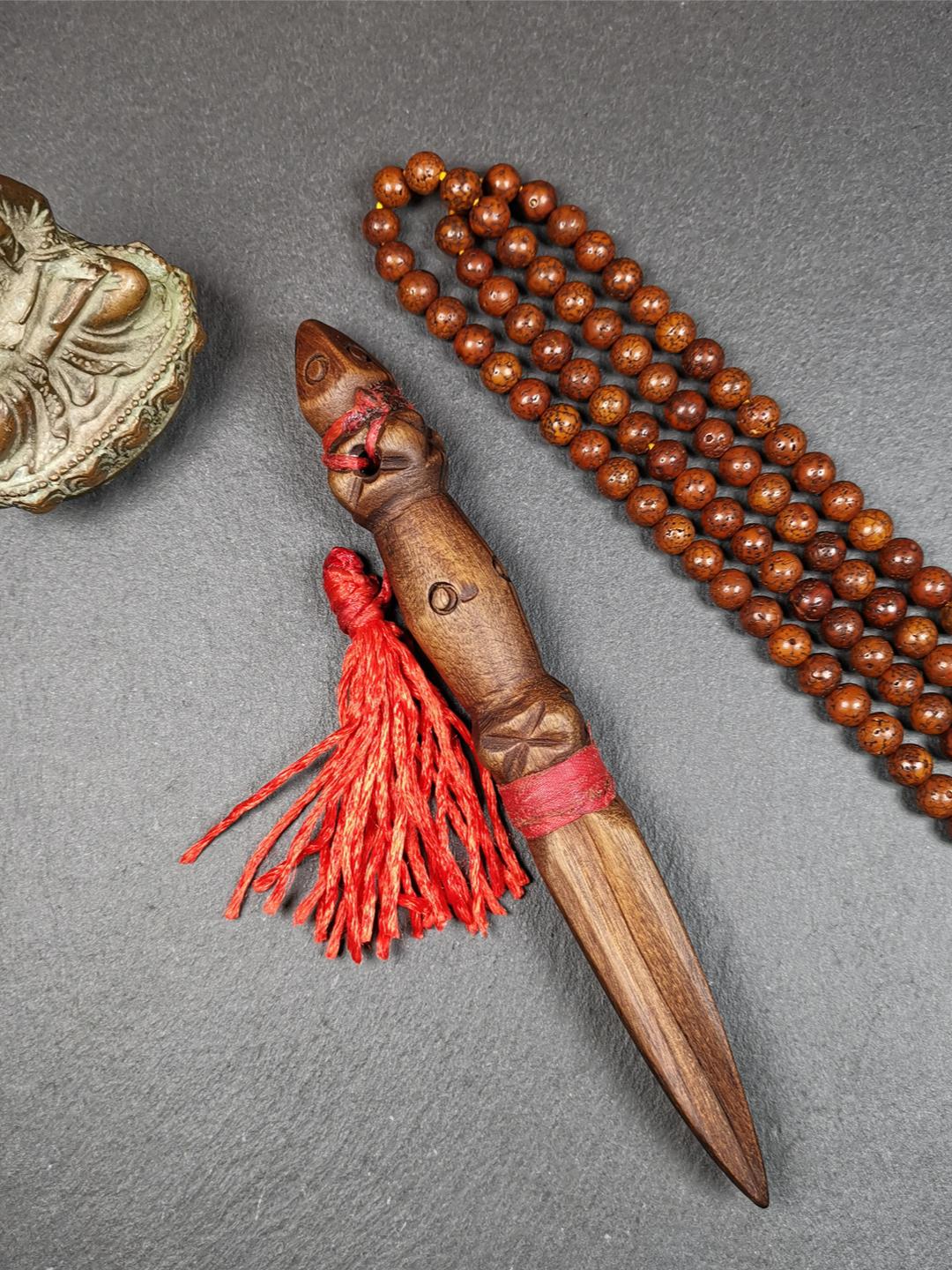 This handmade Dorje Phurba was collected from Derge, Tibet,used in Mahakala buddhist pujas in Gengqing monastery, made of sandalwood, very delicate. You can put it in your Buddhist hall or altar as a ritual decoration