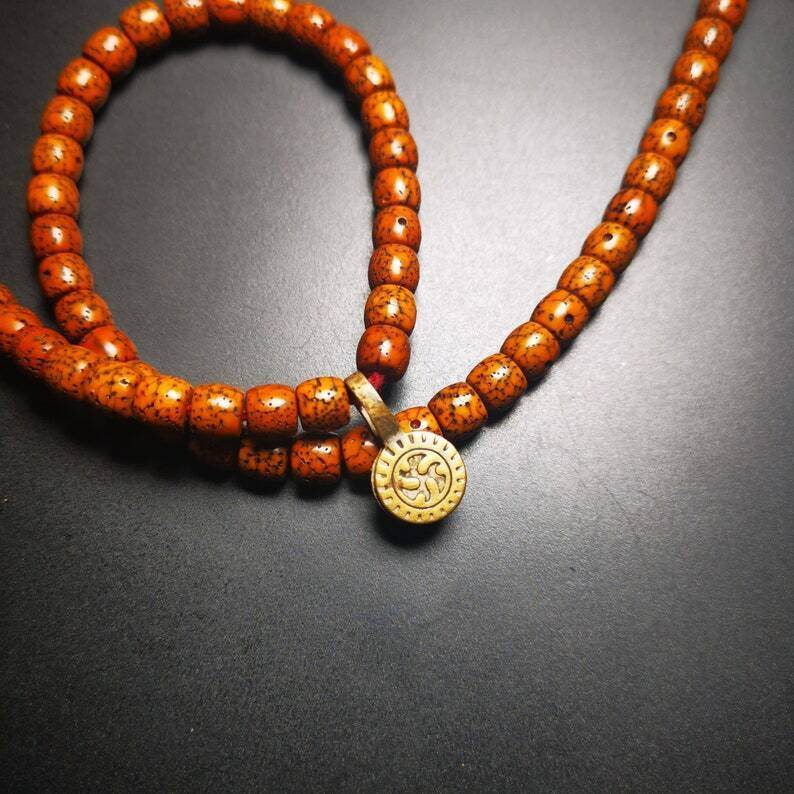 Old Buddhist Mala Counter Clip - Tibetan Buddhist mala beads, close-up detail