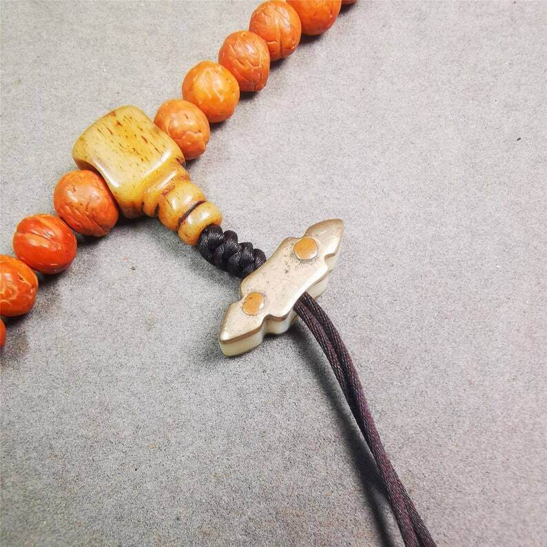 Amulet,Vajra Pendant for Mala,Bag Hanging,Prayer Bead - Tibetan Buddhist mala beads, close-up detail