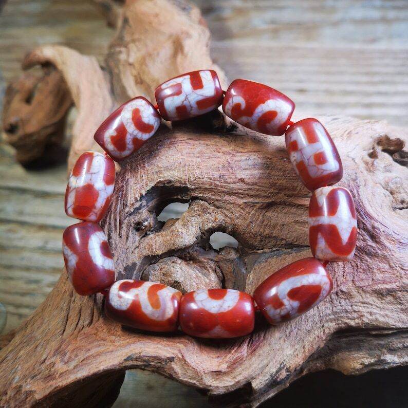 Fire Agate Dzi Bead Bracelet - Tibetan Buddhist mala beads, detailed view