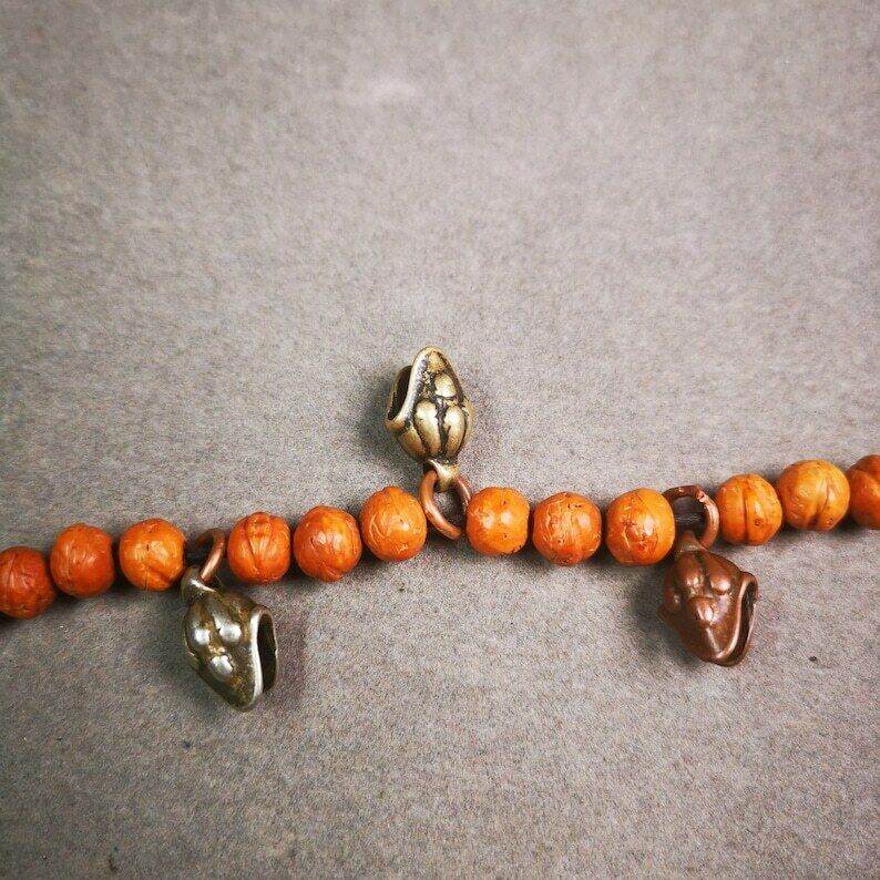 Mala Amulet,Mani Jewel/Wish-Fulfilling Cintamani - Tibetan Buddhist mala beads, detailed view