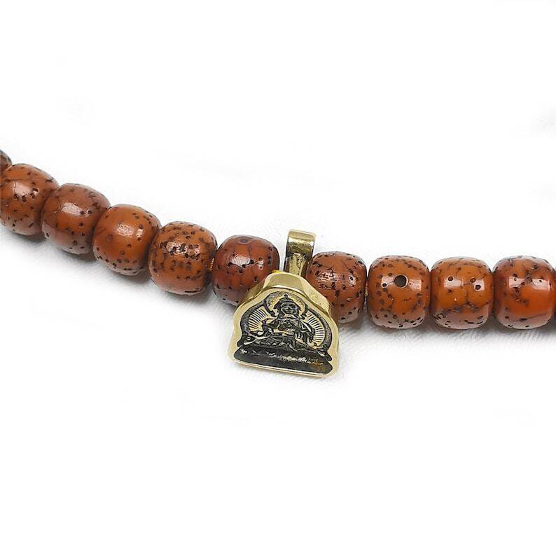 Mini Vajrasattva Tsa Tsa Mold Pendant - Tibetan Buddhist vajra, close-up detail