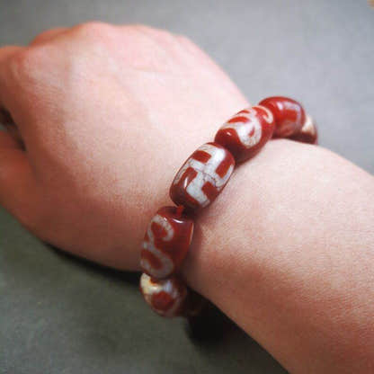 Fire Agate Dzi Bead Bracelet - Tibetan Buddhist mala beads, size reference