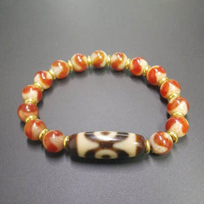 Fire Agate Dzi Bead Bracelet - Tibetan Buddhist mala beads, front view