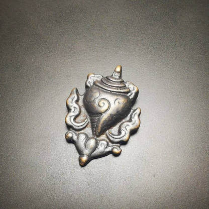 Shankha,Divine Conch Badge,Tibetan Buddhist Amulet Pendant - Tibetan Buddhist amulet, close-up detail
