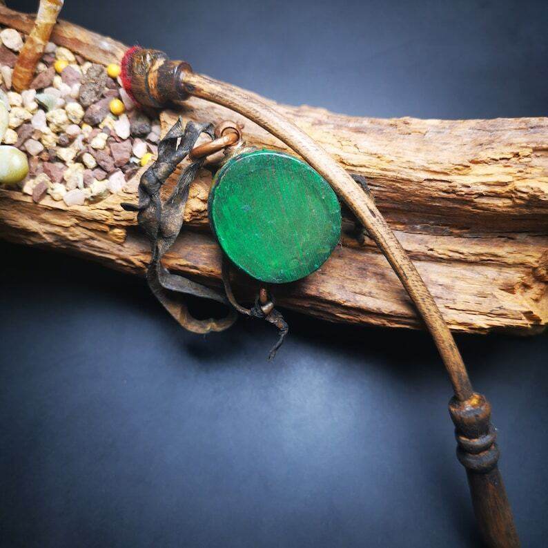 Buddhist Yak Bone Carved Damaru Drum,Mini Chod Drum - Tibetan Buddhist art, close-up detail