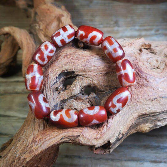 Fire Agate Dzi Bead Bracelet - Tibetan Buddhist mala beads, front view