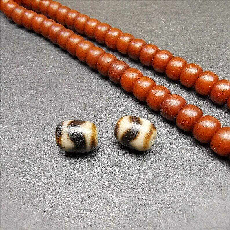 Pair of Tibetan Tiger Tooth Dzi Spacer Marker Beads for Mala,Necklace,0.42" - Tibetan Buddhist mala beads, close-up detail