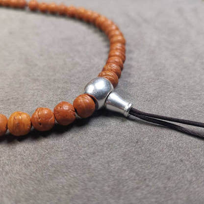 Guru Bead, T-drilled 3-Hole Bead for Prayer Bead - Tibetan Buddhist art, close-up detail