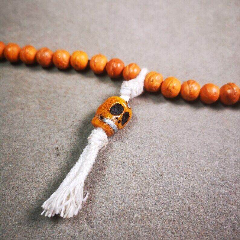 Yak Bone Carved Skull Prayer Bead Pendant,Bead Counter Clip Amulet for Mala - Tibetan Buddhist mala beads, detailed view