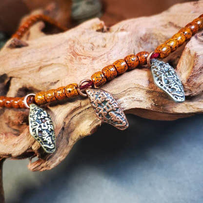 Mala Counter Pendant,OM Bead Amulet - Tibetan Buddhist mala beads, detailed view