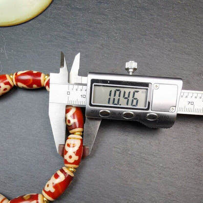 Tibetan Fire Agate Tiger Tooth Dzi Bead Bracelet - Tibetan Buddhist mala beads, size reference