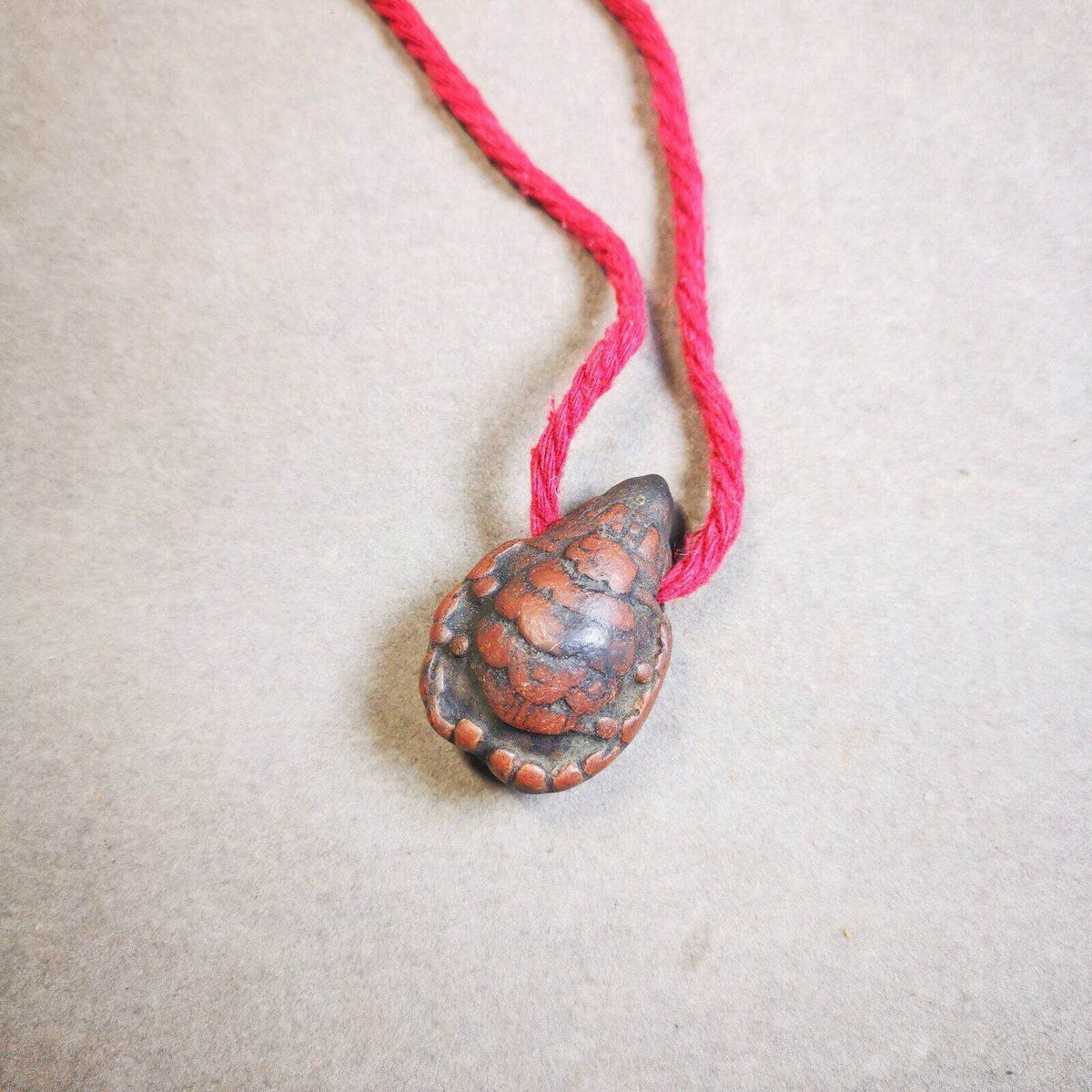 Tsa Tsa Statue Amulet,Scorpion Guru of Padmasambhava - Tibetan Buddhist amulet, close-up detail