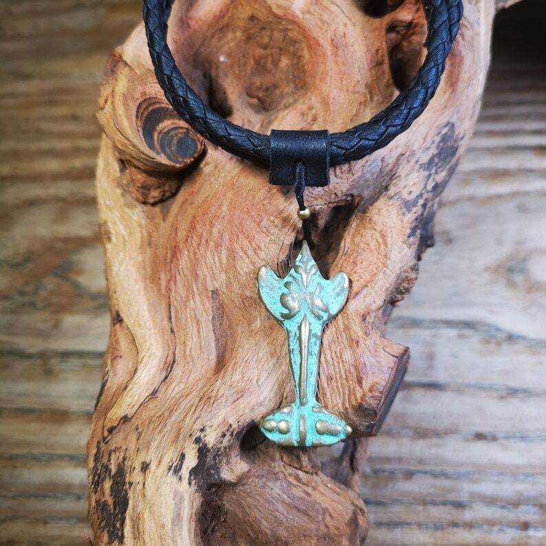 Buddhist Amulet Garuda,Garula,Golden-winged Bird Pendant - Tibetan Buddhist amulet, front view