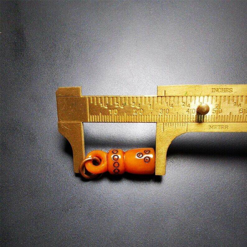 Yak Bone Carved Seal Amulet - Tibetan Buddhist amulet, size reference
