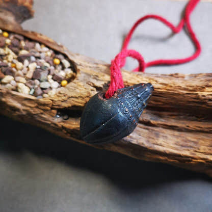 Niang La Tsa Tsa Statue,Stupa Amulet,Pagoda,Scorpion Stamp - Tibetan Buddhist amulet, close-up detail