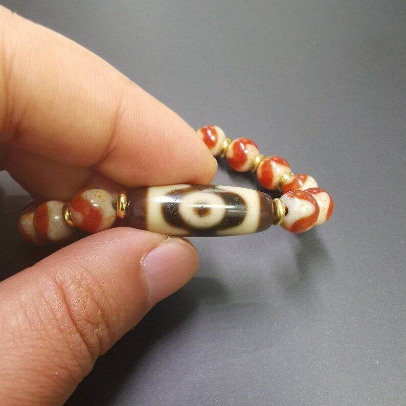 Fire Agate Dzi Bead Bracelet - Tibetan Buddhist mala beads, view 7