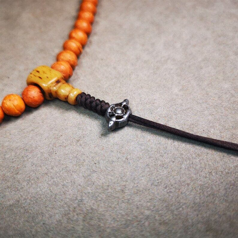 Amulet,Vajra Pendant for Mala,Bag Hanging,0.6" - Tibetan Buddhist mala beads, close-up detail
