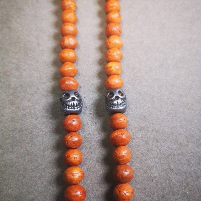 Citipati Skull Marker Beads 0.4" - Tibetan Buddhist art, detailed view