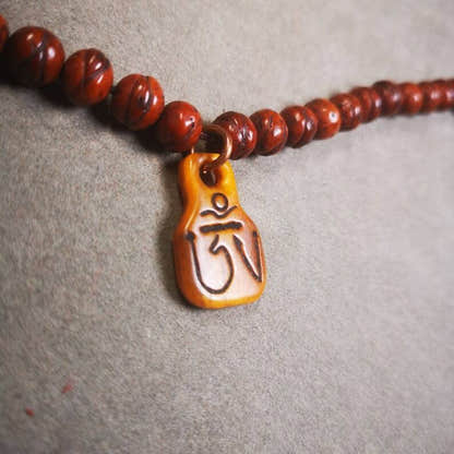Yak Bone Carved Prayer Bead Pendant 0.98" - Tibetan Buddhist art, detailed view