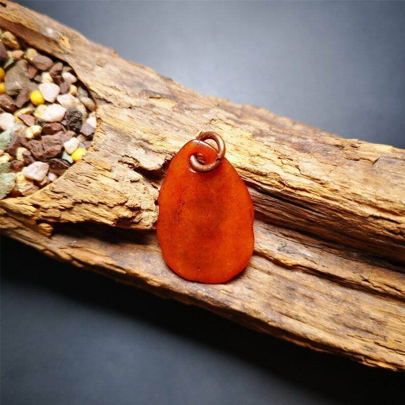 Amulet,Yak Bone Carved Buddha Eye Pendant - Tibetan Buddhist amulet, detailed view
