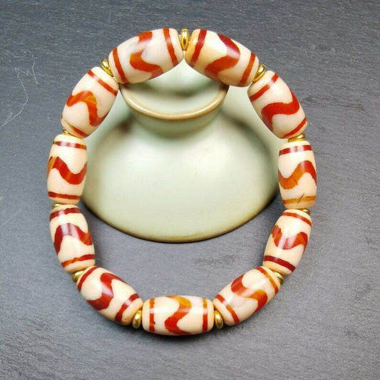 Fire Agate Tiger Tooth Dzi Bead Bracelet - Tibetan Buddhist mala beads, front view