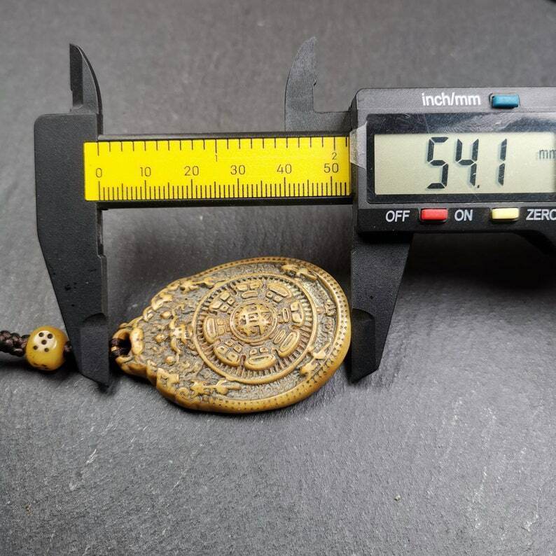 Buddhist Calendar Amulet,Yak Bone Carved Melong Mirror,SIPAHO srid pa ho Badge - Tibetan Buddhist amulet, size reference