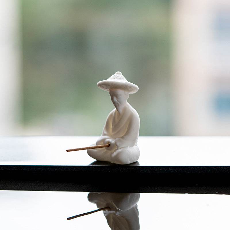 Ceramic Fisherman Incense Holder - Tibetan Buddhist statue, detailed view